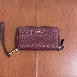 Coach Double Zip Phone Wallet in devised patent leather